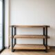Industrial bookshelf console in solid wood and steel.