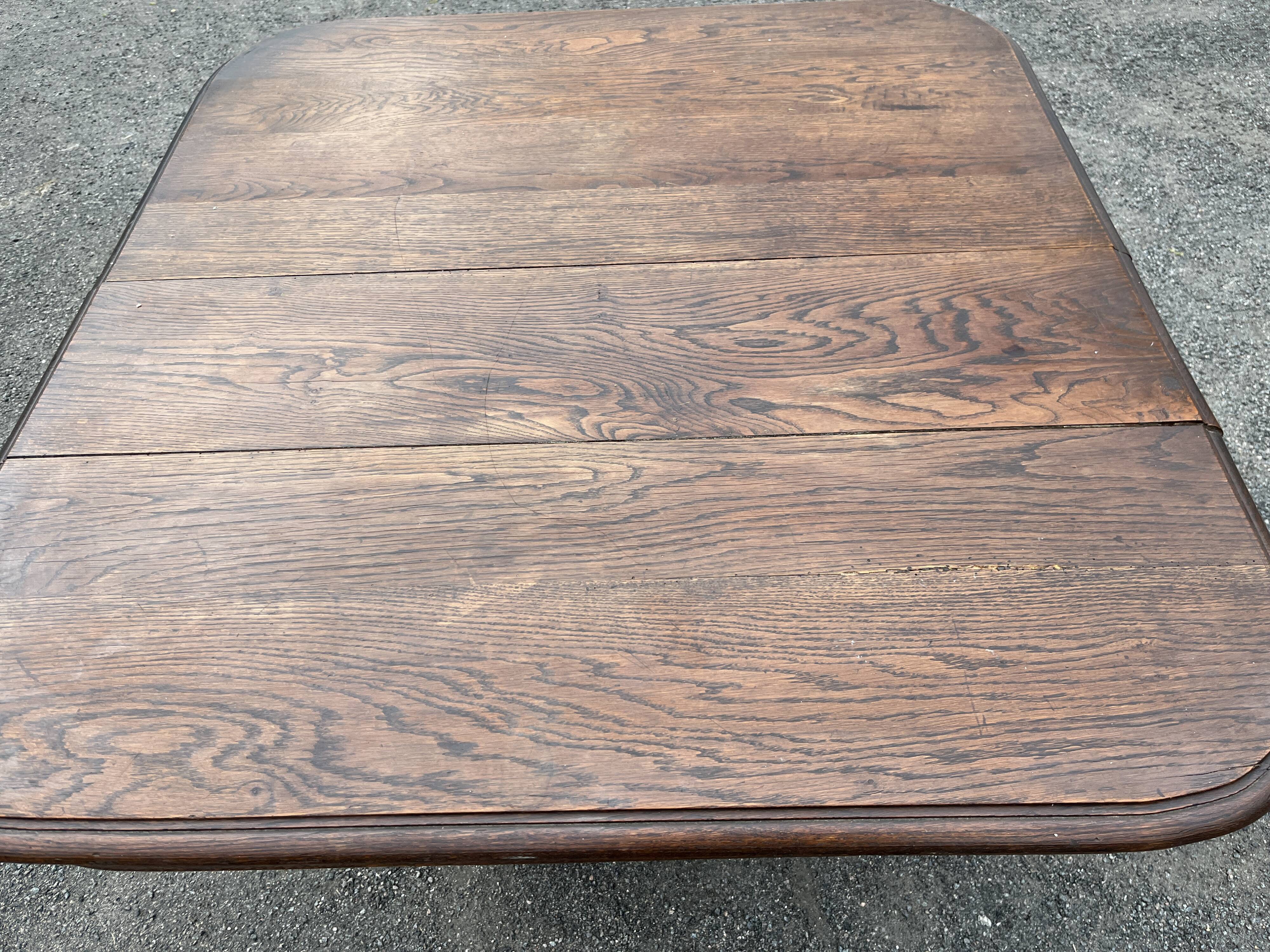 Henry II style oak dining table