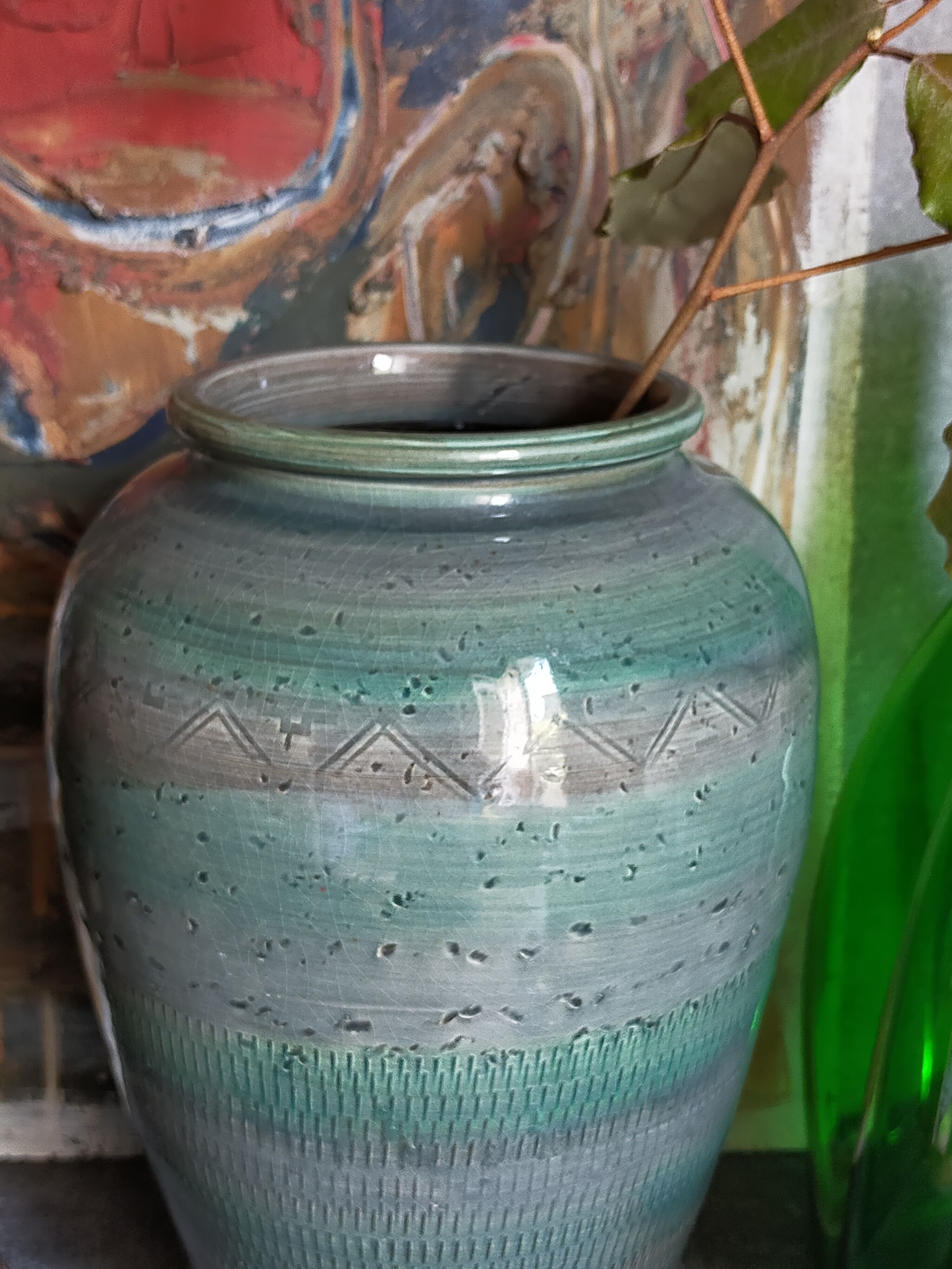 Oblong ceramic vase sacrificed with blue enamel