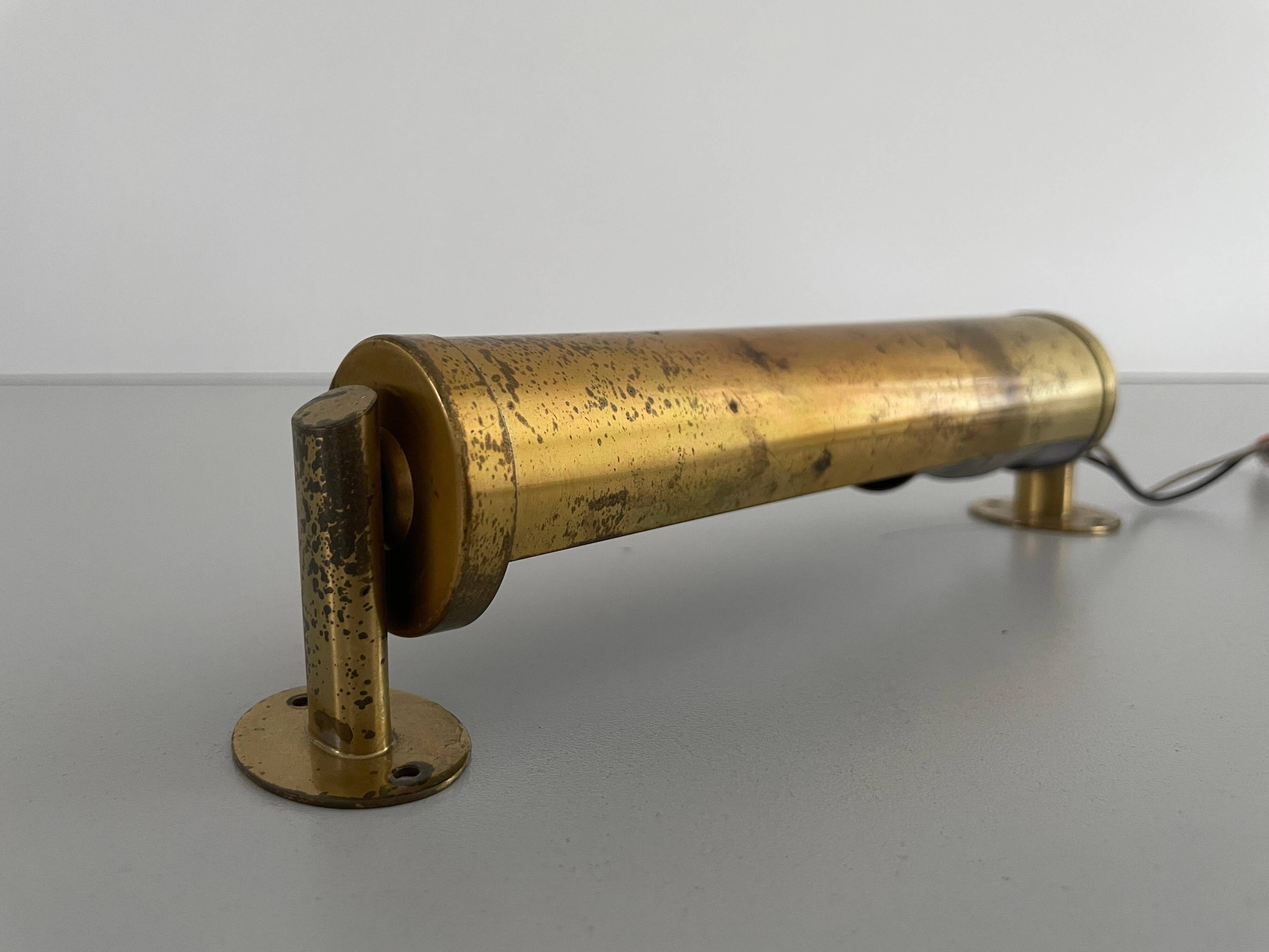 Small simple cylindrical brass wall light from the mid-century, 1950s, Germany.