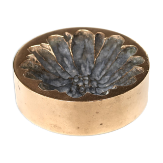 Bronze paperweight by Monique Gerber, flower imprint, 1970s