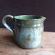 Handcrafted enameled terracotta pitcher signed