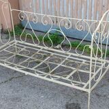 Magnificent bench/antique wrought iron bed.