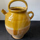 Cruche gargoulette chevrette en terre cuite vernissé jaune