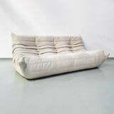 Canapé 3 places en velours côtelé blanc cassé attribué à Michel Ducaroy pour Ligne Roset, années 1970.