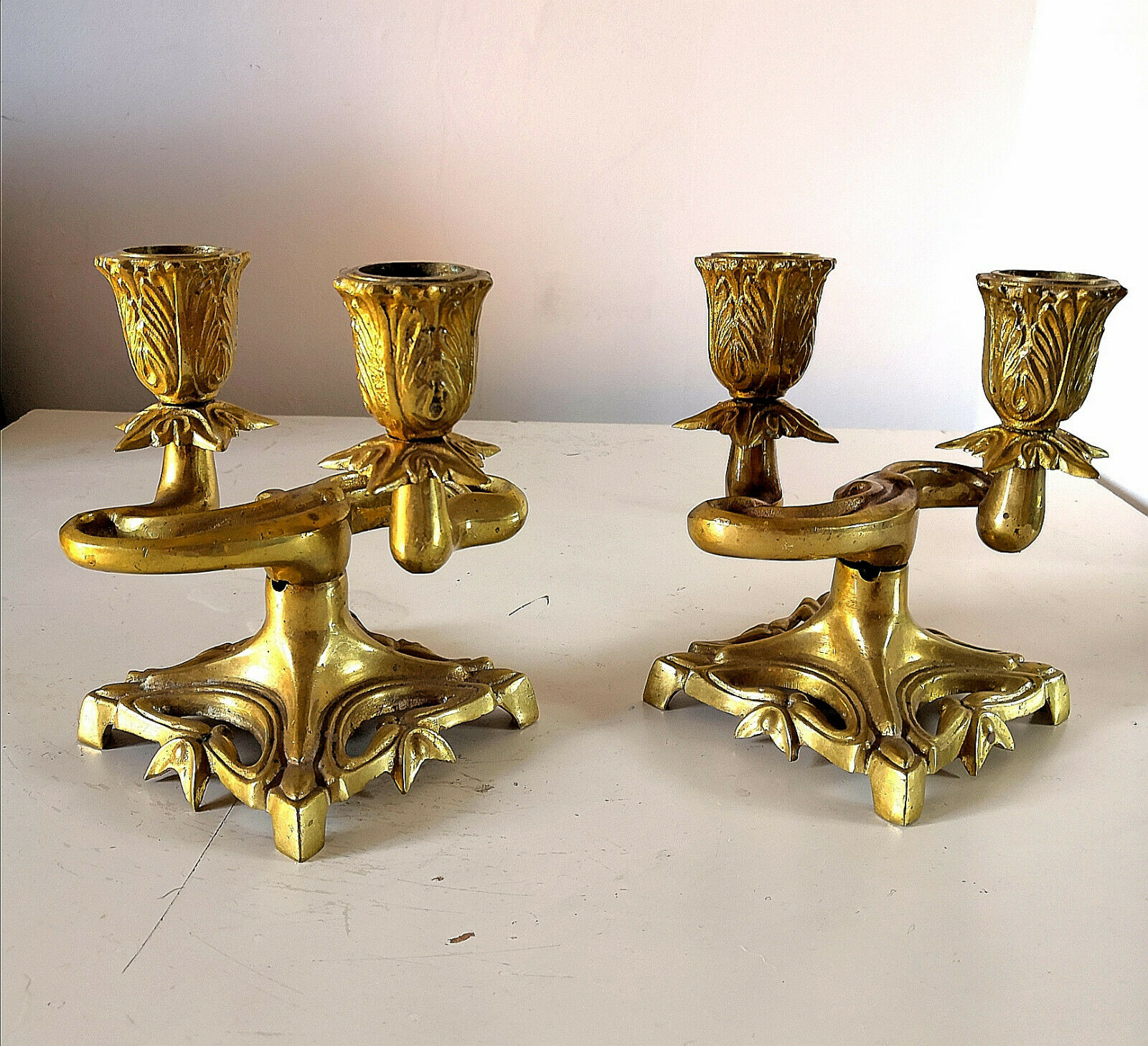 Pair of art nouveau design candlesticks in bronze