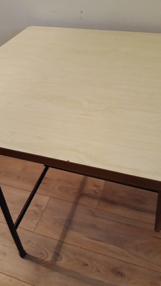 White formica and black metal feet desk