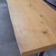 Large bistro table with a wooden top and cast iron legs - 2m56