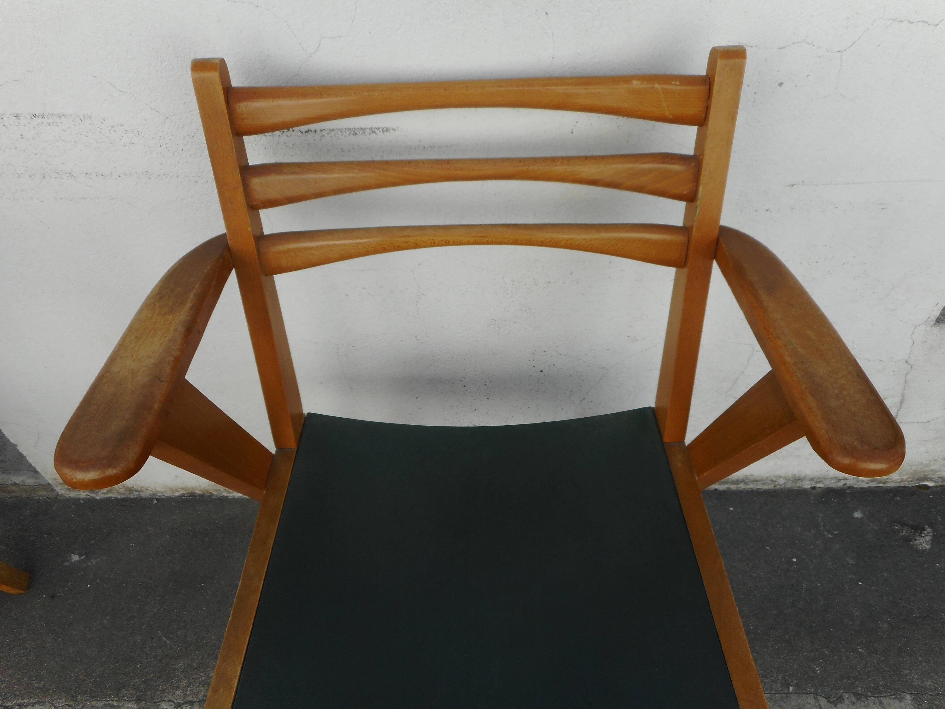 Pair of light wood armchairs