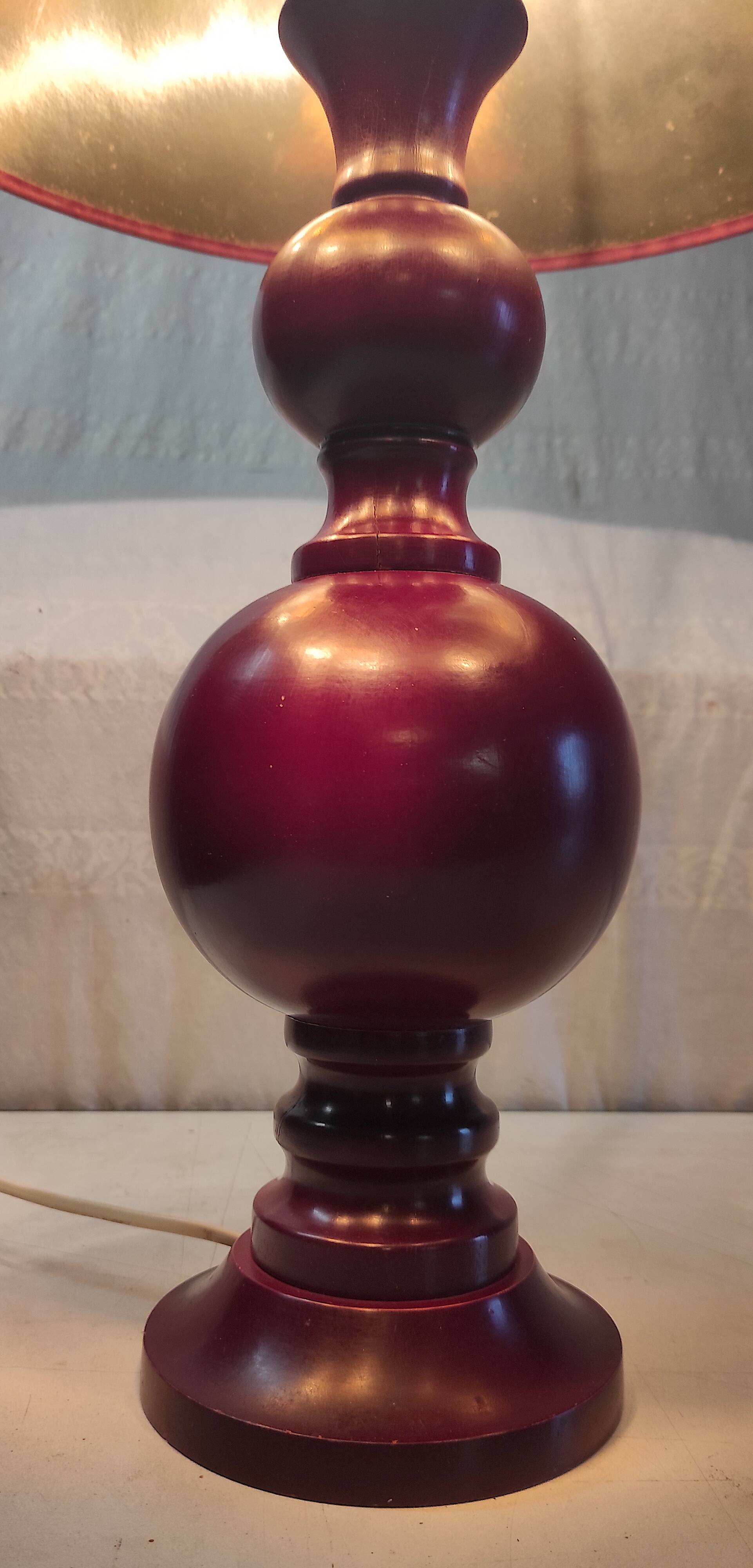 Turned wood table lamp in plum color - 1970s