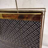 Vintage gold magazine rack from the 1960s.