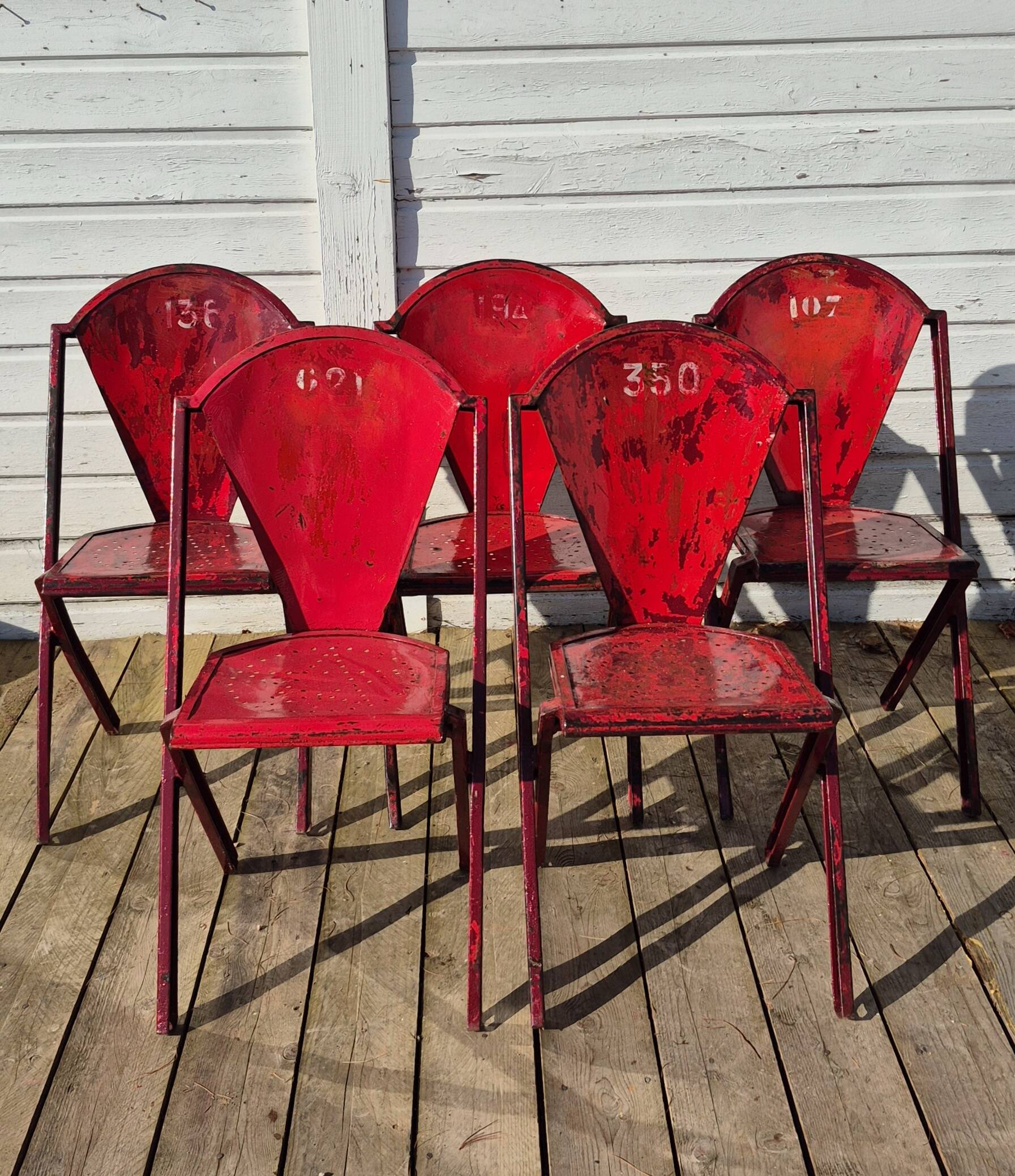 Set of 5 François Caruelle metal chairs