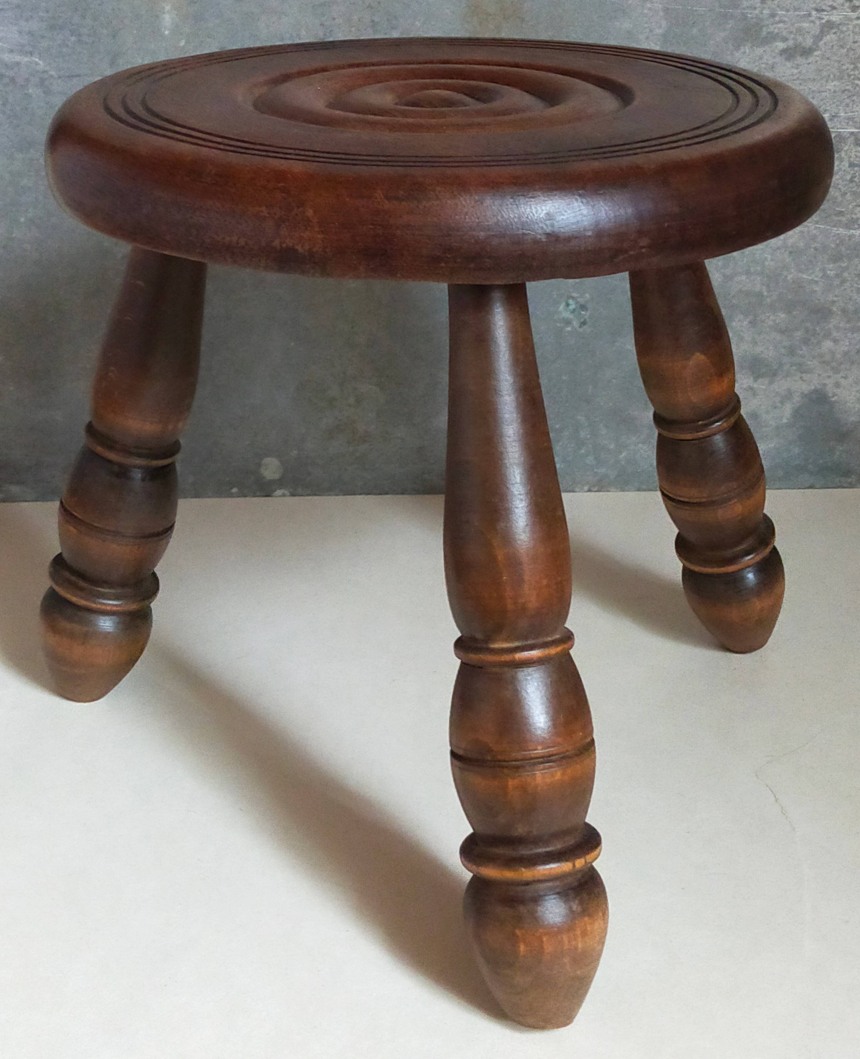 Low tripod stool in vintage turned solid wood