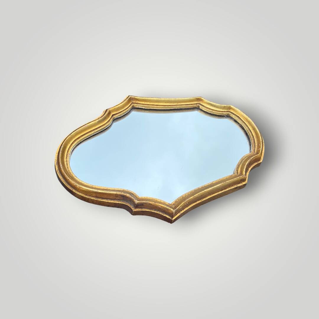 Small antique wall mirror in gilded resin – rocaille style