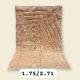 Mrirt carpet in camel/powder pink with textured abstract patterns.
