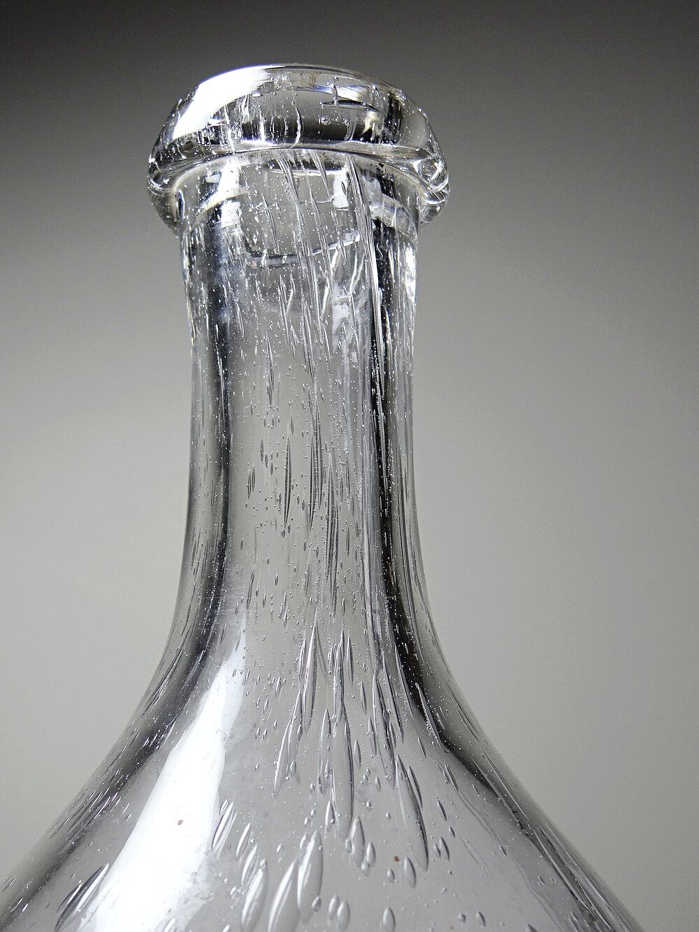 Large antique blown glass bottle with bubbles, early 20th century 1900-1920.
