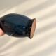 Decorative deep blue glazed ceramic vase with twin handles.