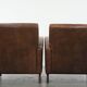 Elegant set of two sheepskin leather armchairs with beautiful round shapes