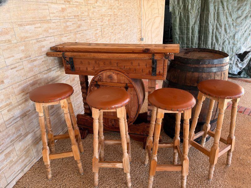 Bar with 4 stools and a barrel