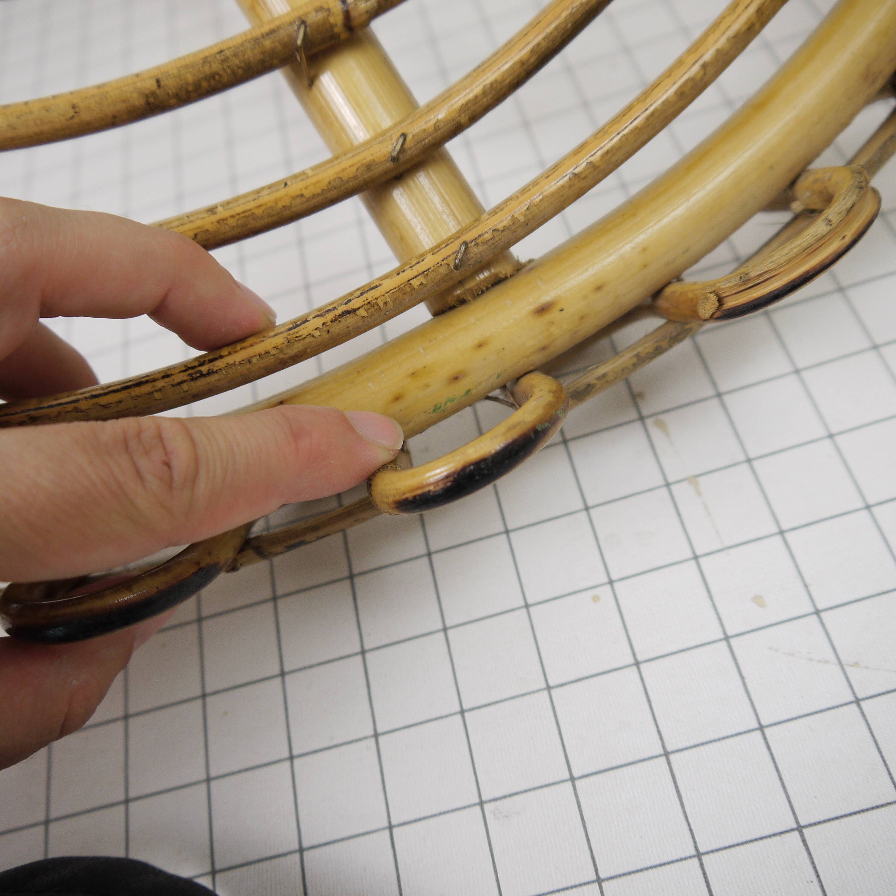 Half-moon rattan shelf and coat holder