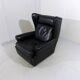 Fauteuil à oreilles en cuir noir sur roulettes années 1960