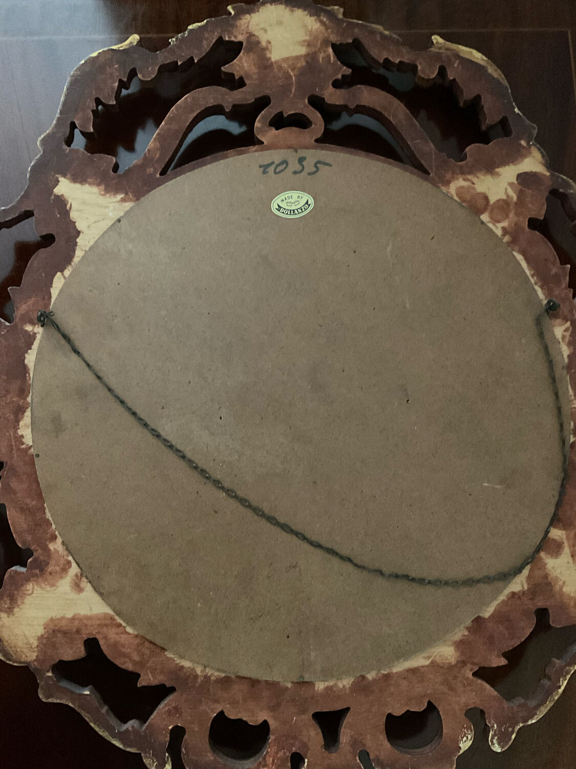 Ancient witch's eye mirror Dollanzo Italy in gilded wood