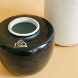 Duo of small black and white ceramic vases