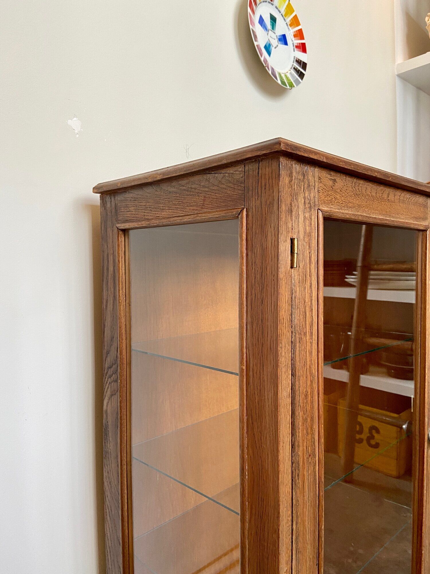 Dark wood display case and transparent glass