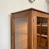 Dark wood display case and transparent glass