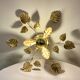 Gold leaf metal flower wall sconce 1970s 1980s Hollywood Regency Masca leaf