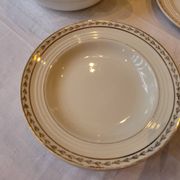 Table service in opaque porcelain with gold leaf.