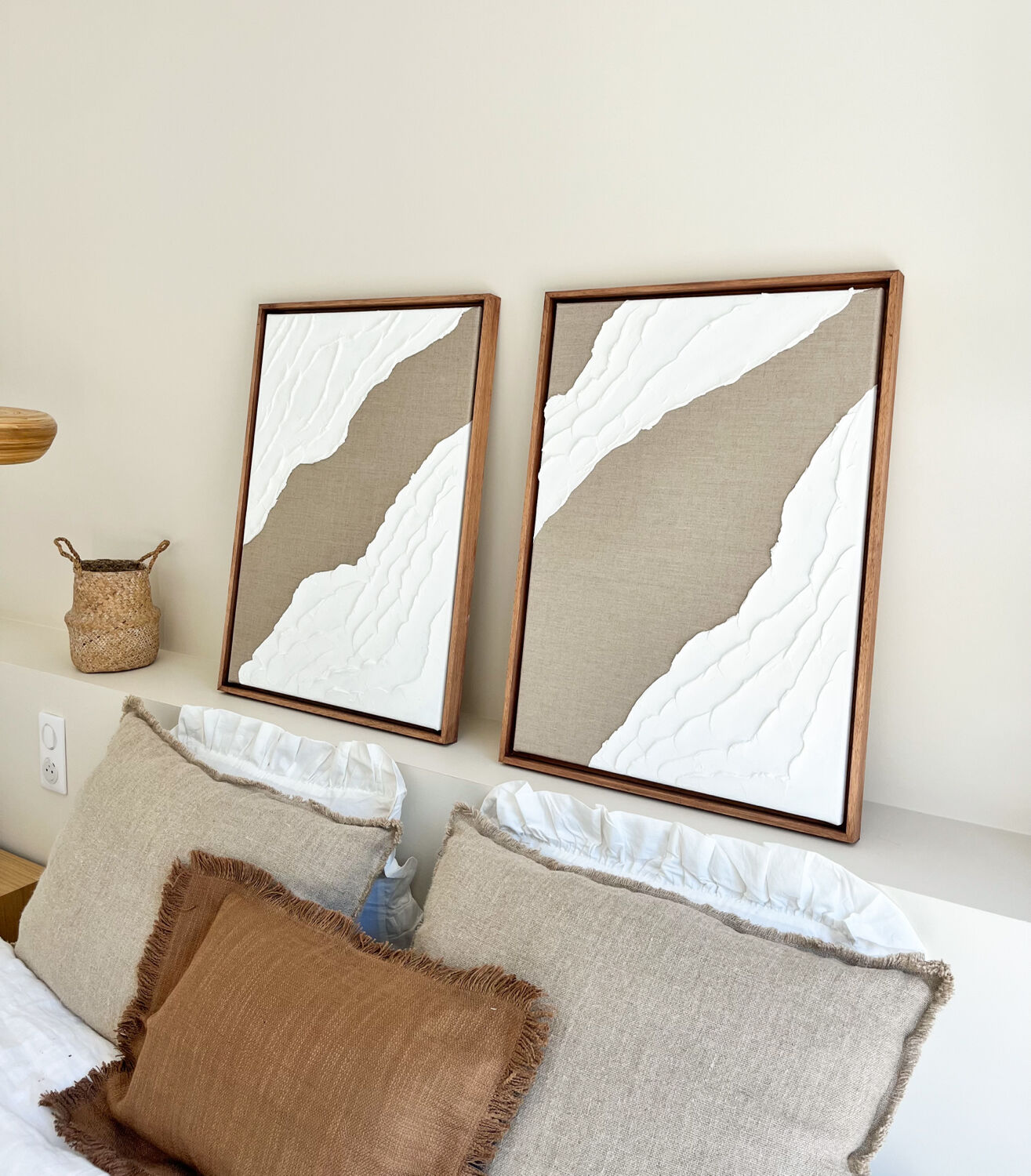 Diptych relief panels in linen and white.