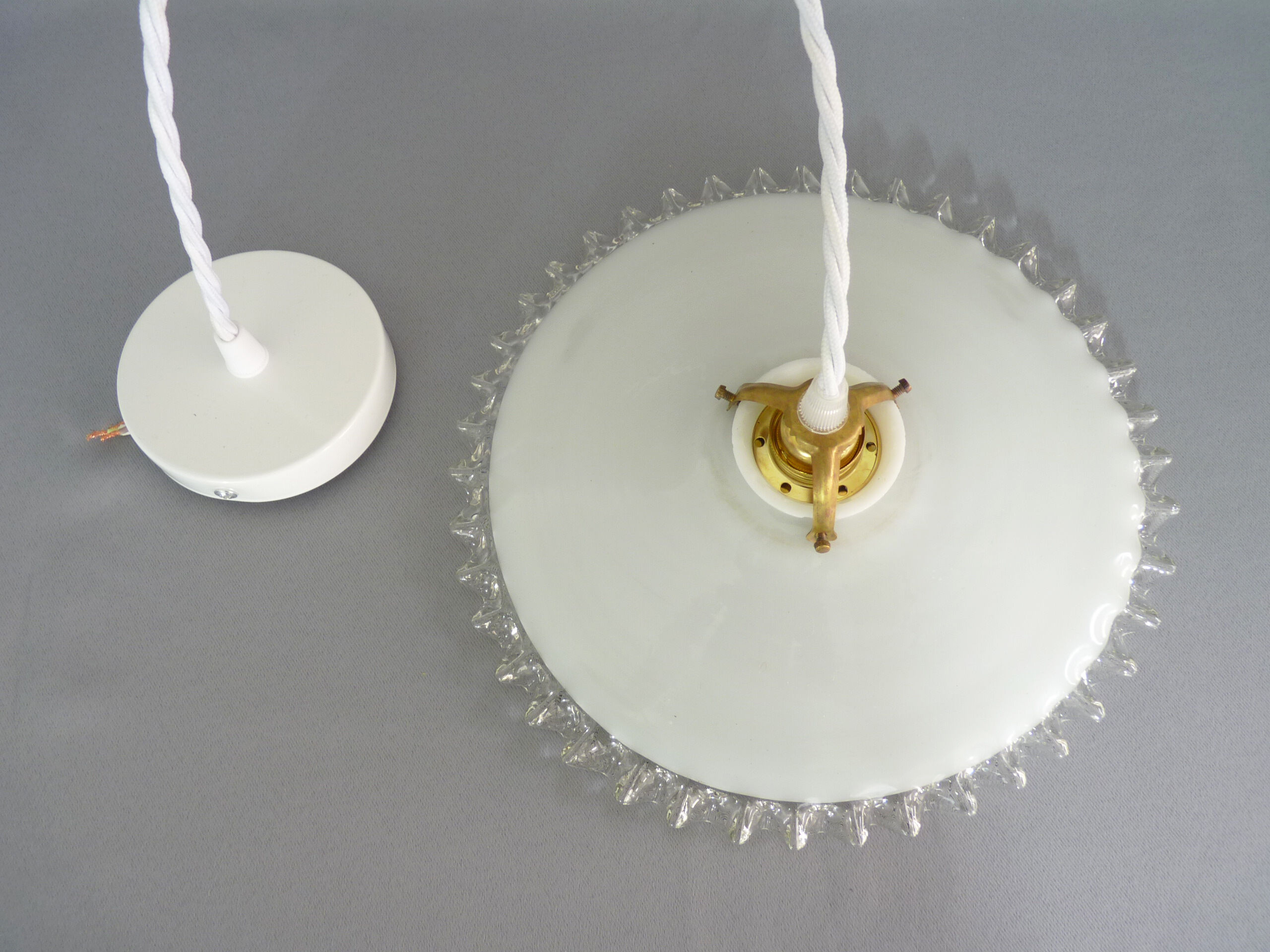 Flat white opaline hanging with transparent toothed collar