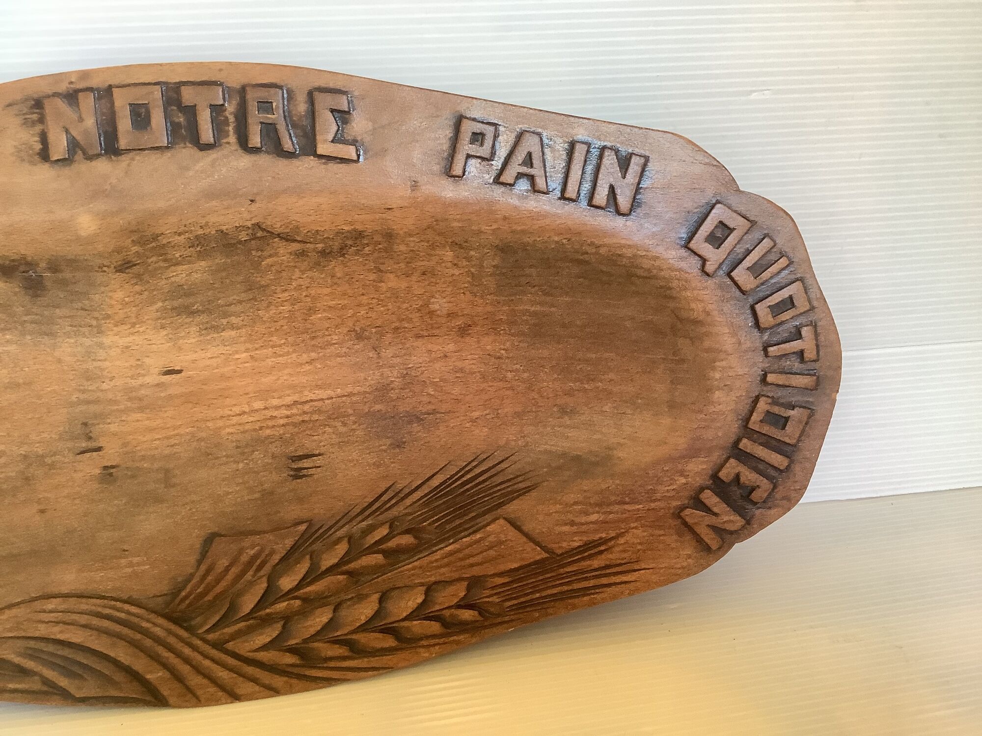 Carved wood dish ears of wheat give us our daily bread