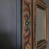 Small beaded mirror decorated with arabesques mid-20th century