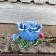 Old barbotine candle holder in the shape of a rose