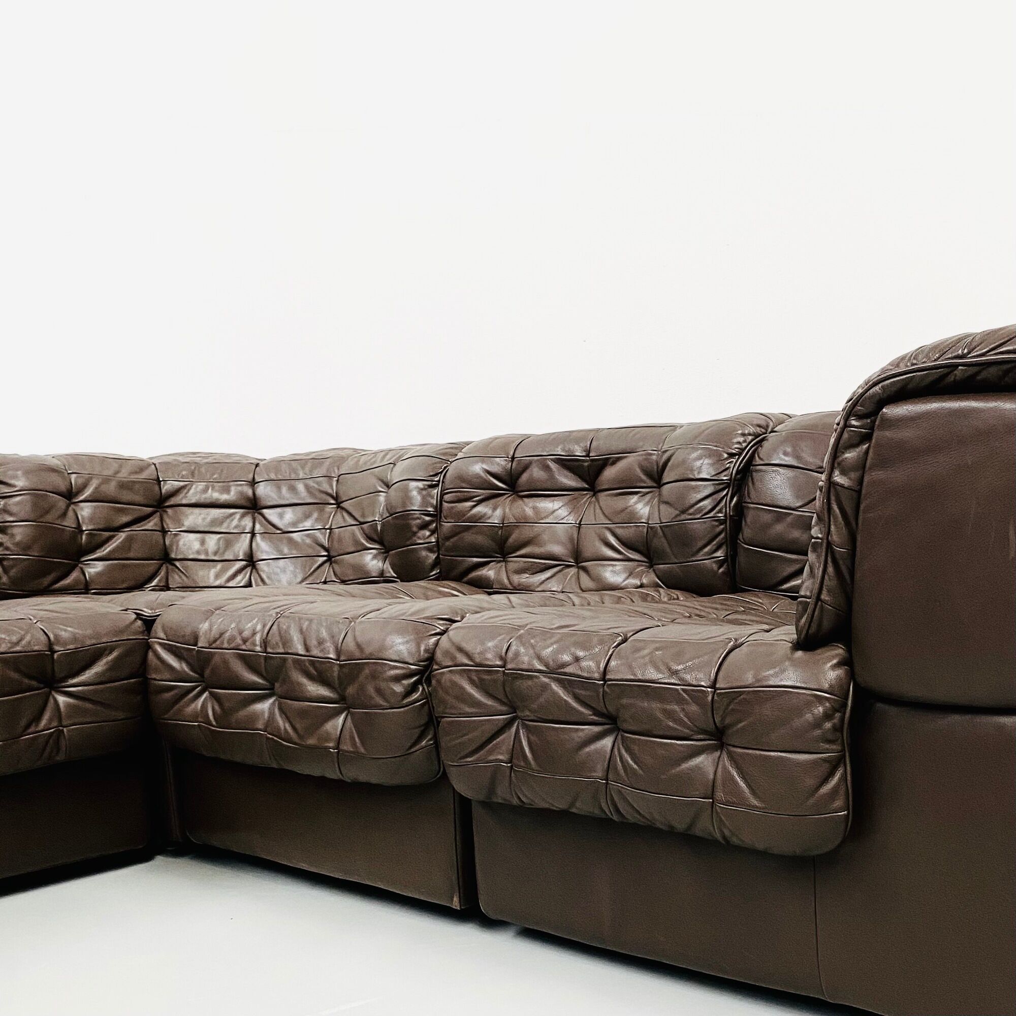 Swiss dark brown patchwork modulair DS-11 sofa by the Desede Design team for DeSede, 1970s
