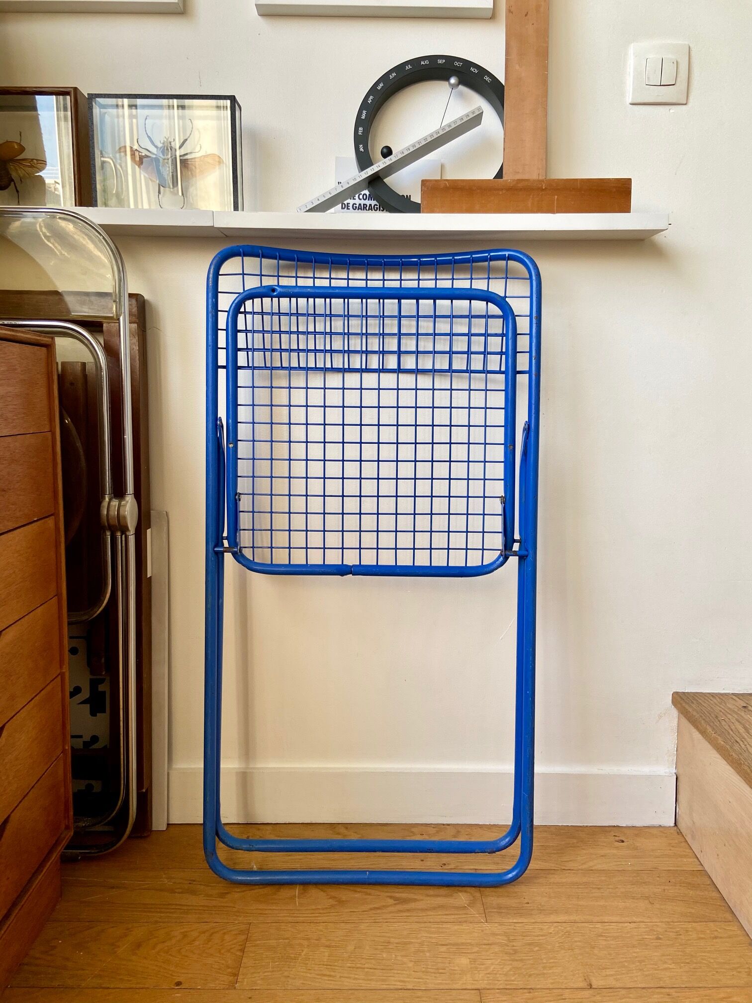 Blue "Ted Ned" folding chair by Niels Gammelgaard