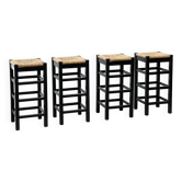 ensemble de quatre tabourets de bar en rotin et bois