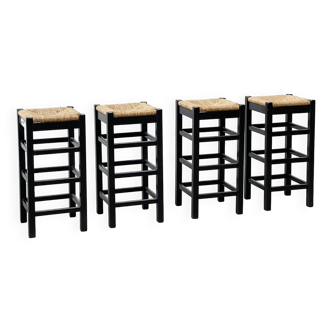 set of four rattan and wood barstools