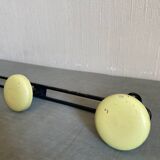 2 black and yellow metal wall coat racks