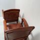 Paire de fauteuils style colonial en tech et cuir vintage