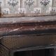Louis XIV style fireplace in veined Carrara marble and 19th-century ceramics.
