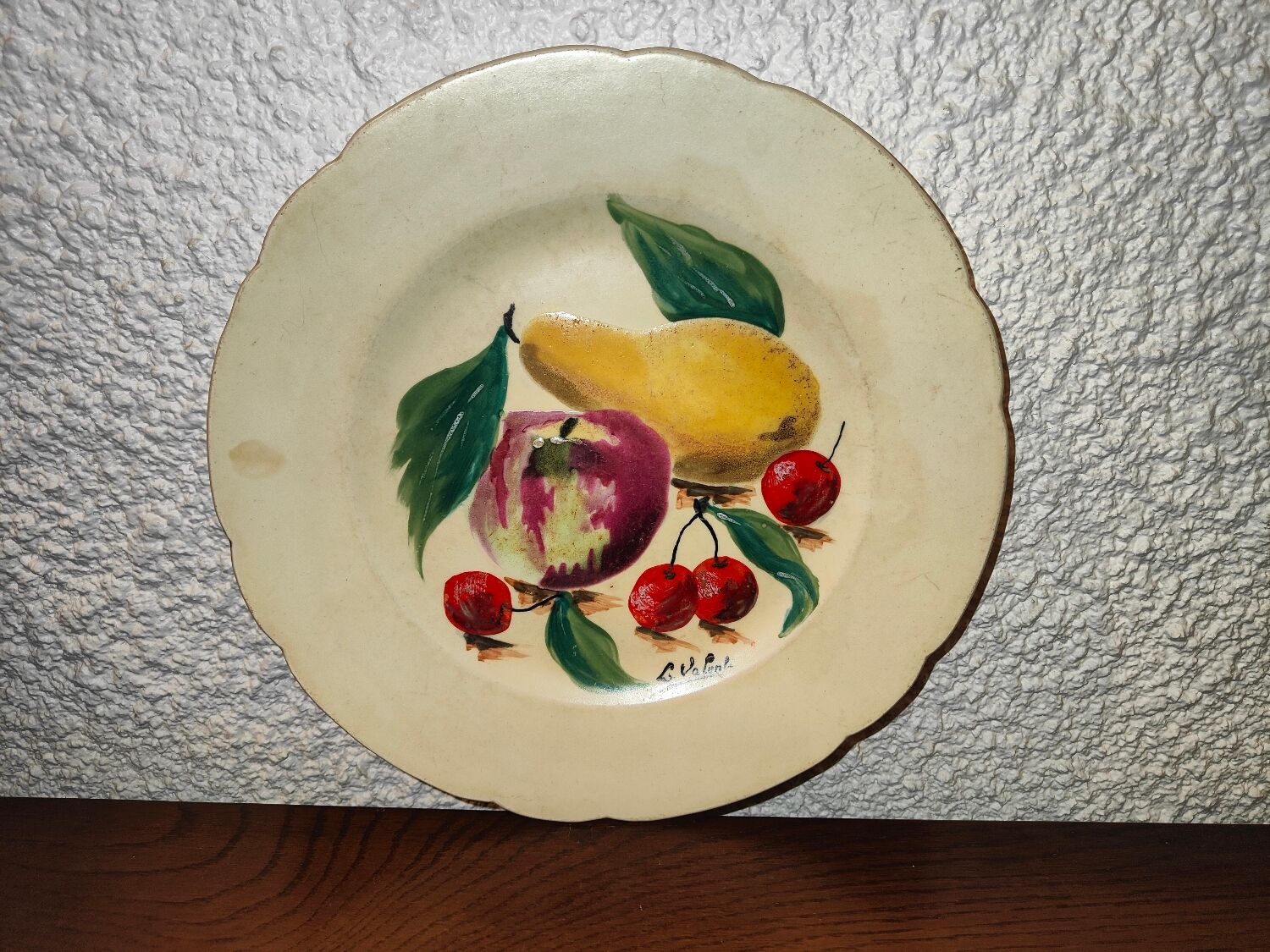 Faience plate in Longwy enamels signed Léa Valentin Les Fruits