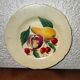 Faience plate in Longwy enamels signed Léa Valentin Les Fruits