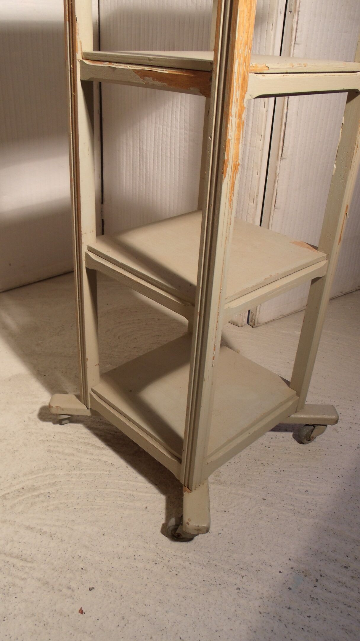 shabby wood side table on wheels
