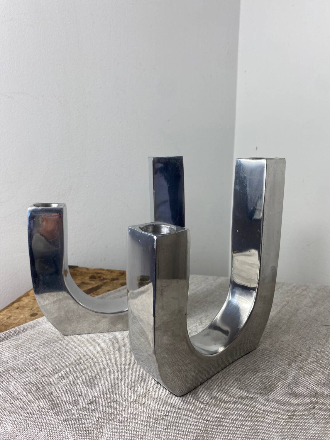 Designer candle holders in brushed aluminum