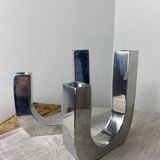 Designer candle holders in brushed aluminum