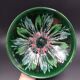 Green faience bowl decorated with multicolored drips around 1970
