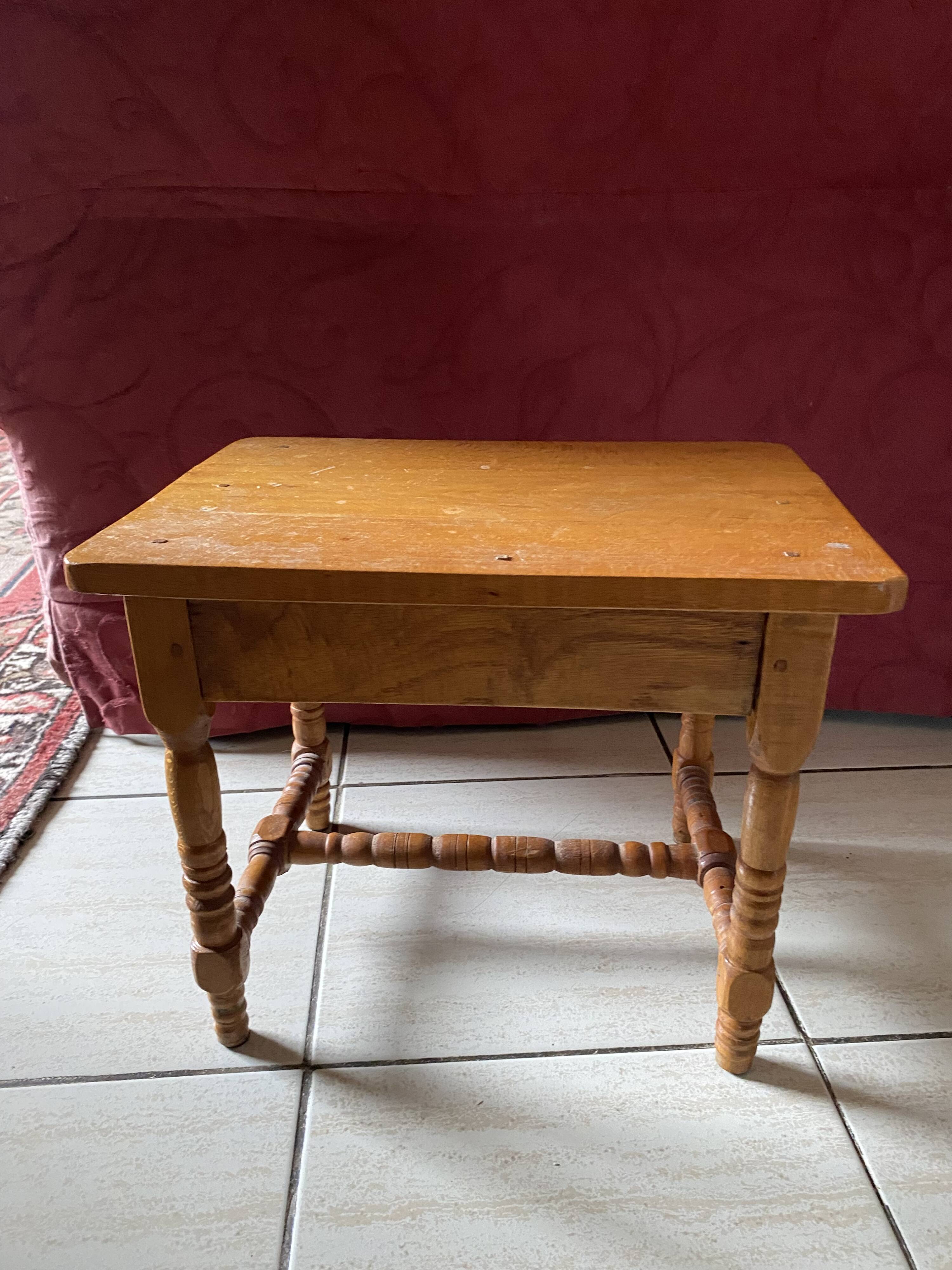 Small footrest bench in bohemian style.